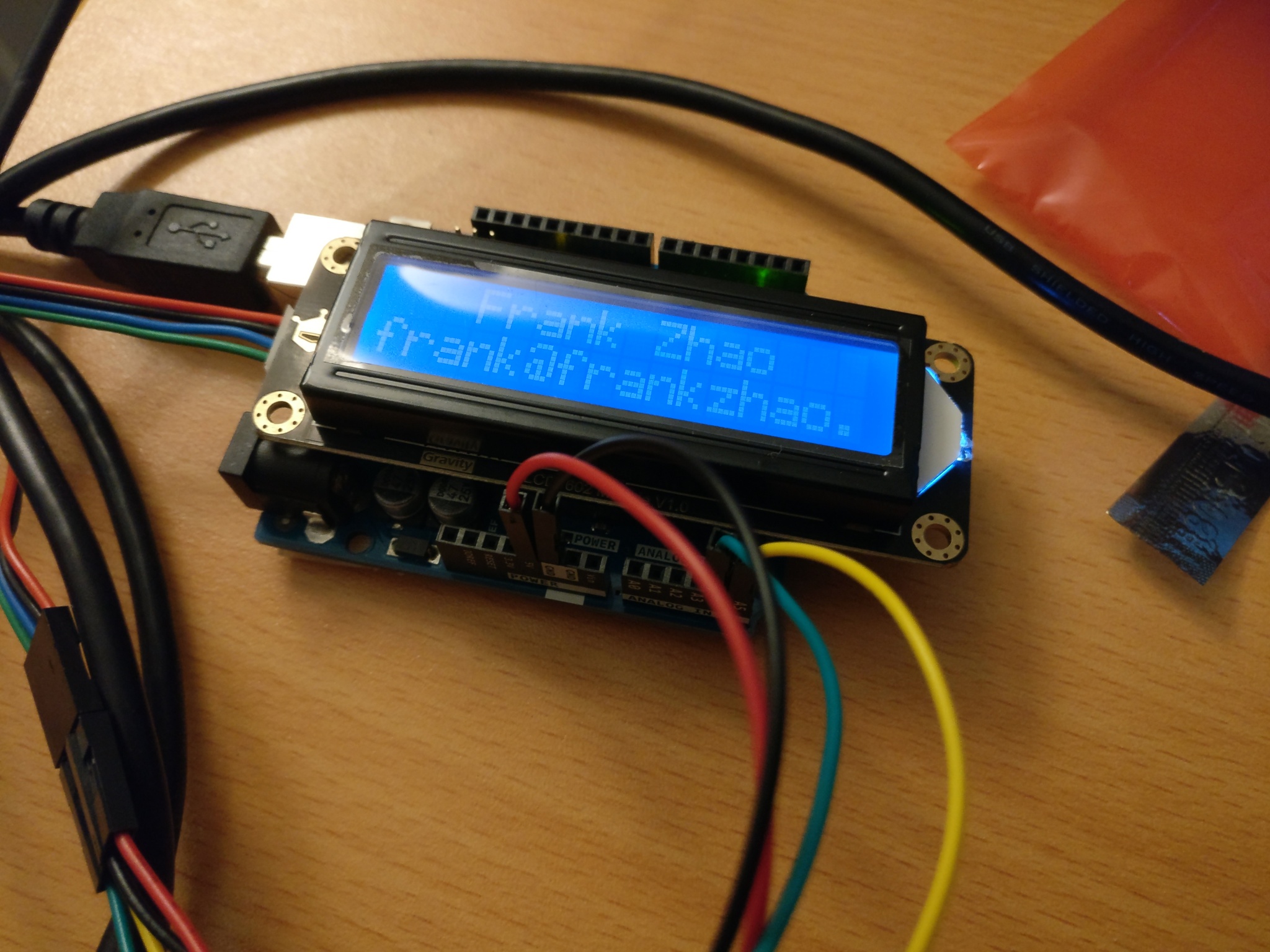 DFRobot LCD1602 I2C module with with blue background.
